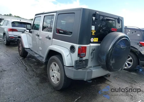 2010 Jeep Wrangler Unlimited Sahara from USA, damaged, VIN 1J4BA5H16AL167487